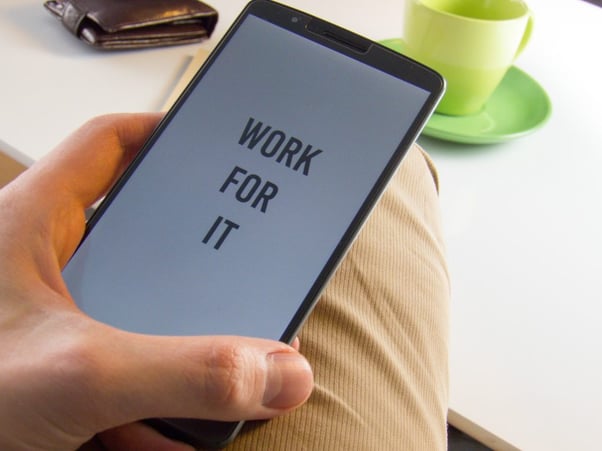 Smartphone screen that says 'work for it' - 10-tips-on-how-to-become-a-professional-writer-Copify-4-1024x768-1