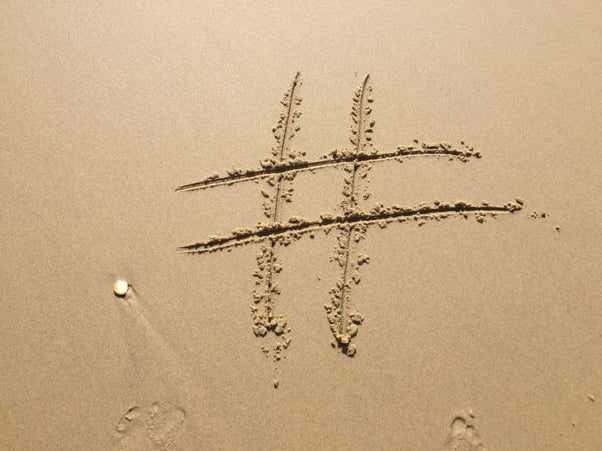 Hashtag written in sand 9-content-idea-generator-tools-Copify-blog-2-740x555-2
