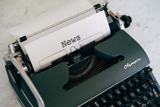 Typewriter typing 'news' - Content-creation-checklists-Copify-blog-1-768x512-2