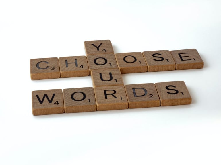 Scrabble tiles spelling 'Choose your words' - What are some common SEO mistakes in digital content production - Copify blog 1