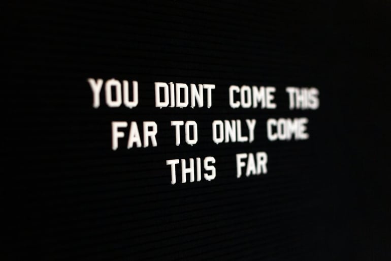 White quote on black background that reads 'You didn't come this far to only come this far' - What is a hook in writing - Copify blog