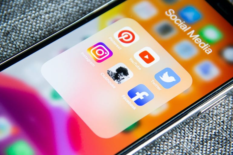 Close up of bright social media icons on a smartphone screen -is social media inbound or outbound marketing - Copify blog
