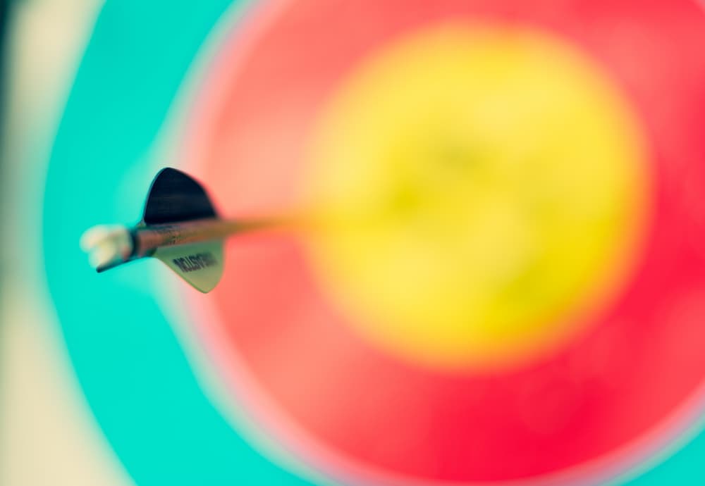 Dartboard with arrow in target - What is SEO copywriting? - Copify blog